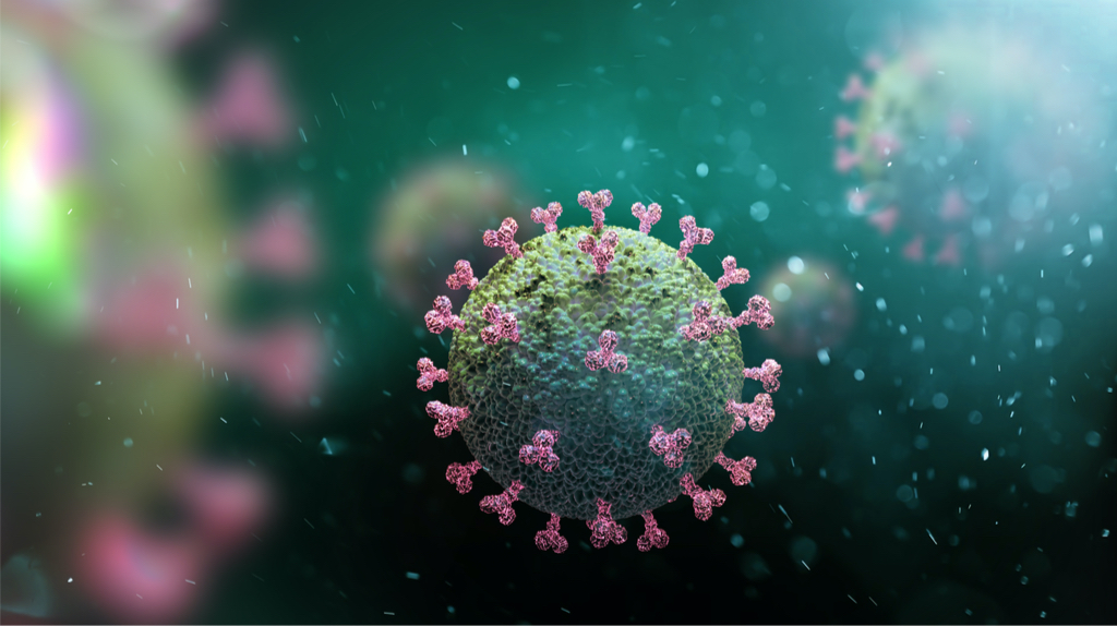 RNA coronavirus in pink and green colors.