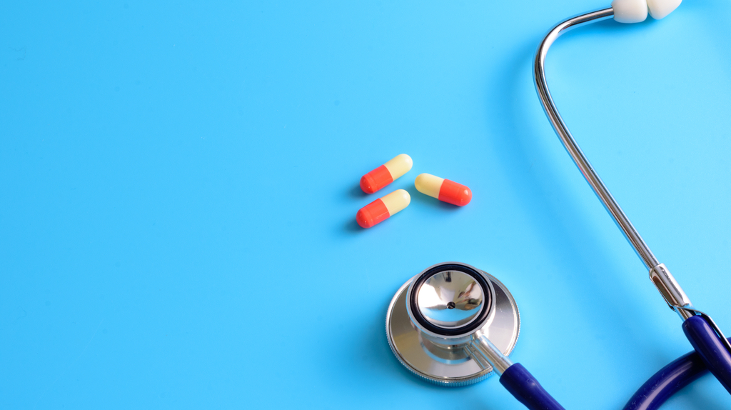 doctor's stethoscope and tablets.